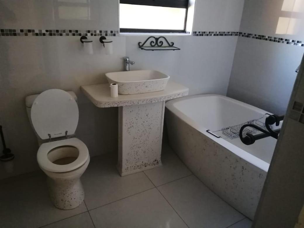 Alu Guesthouse Roodepoort Quarto foto